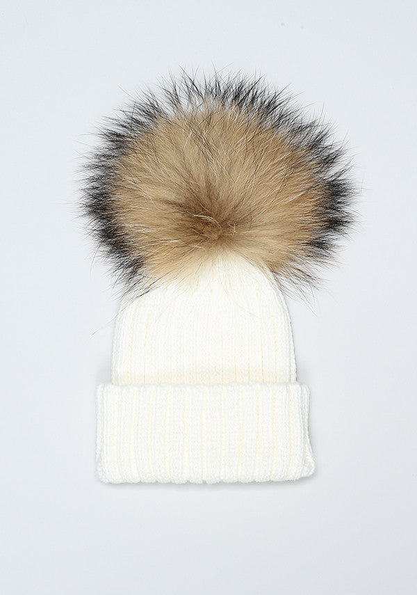 Bobble hat with fluffy hot sale bobble